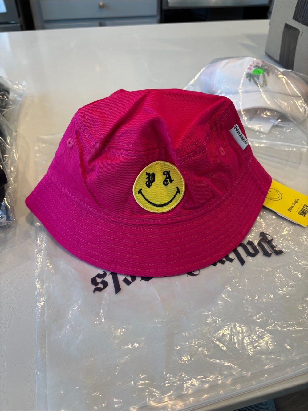 Palm Angels Hot Pink Bucket Hat with Yellow Smiley Patch